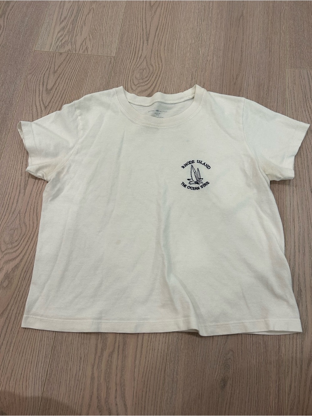 Brandy Melville Cream Crop Tee with Navy Sailboat Graphic